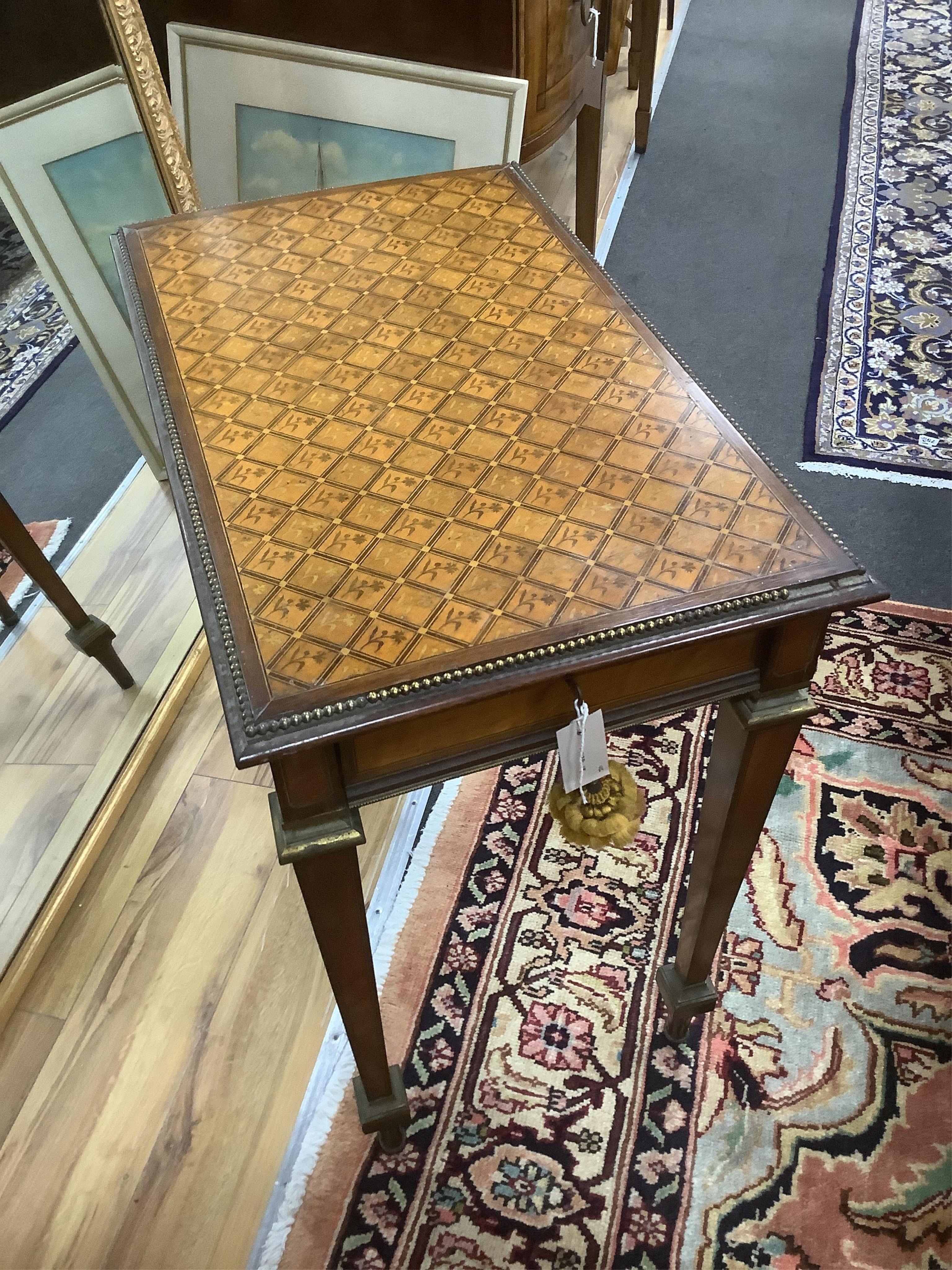 A late 19th century English Louis XVI style gilt metal mounted marquetry inlaid centre table, width 72cm, depth 44cm, height 71cm. Condition - fair